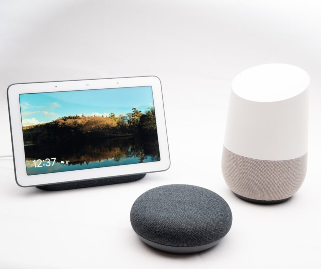 Three home technology devices on a white background.